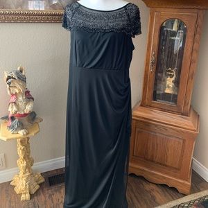Black iridescent beaded evening gown.